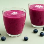A smoothie recipe called the elixir of youth: berries, kefir, and lemon in a glass of energy